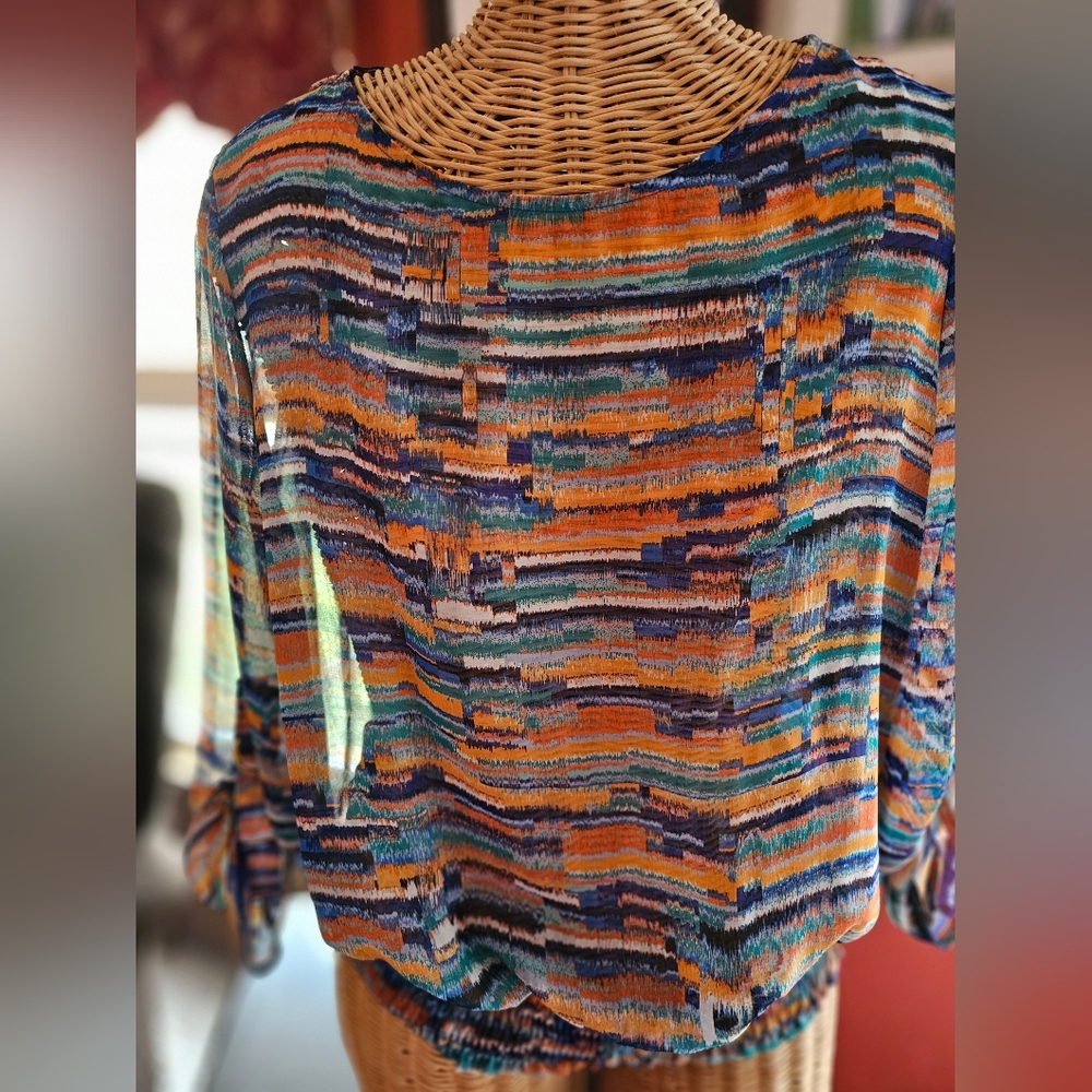 Womans John Paul Richard size XL top.